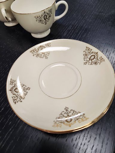 EGGSHELL NAUTILUS SET OF 4 - 6" saucers