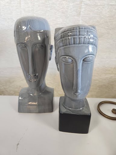 SET OF 2- ceramic kanute sculpture