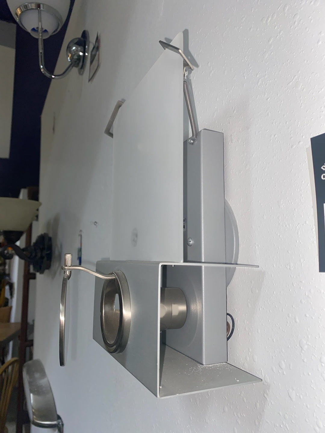 Silver hooded wall sconce