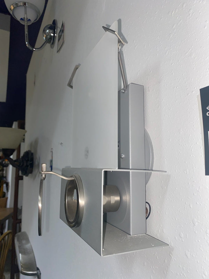 Silver hooded wall sconce