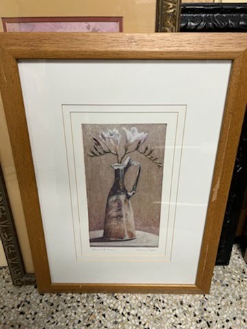 Wood frame with flowers in vase