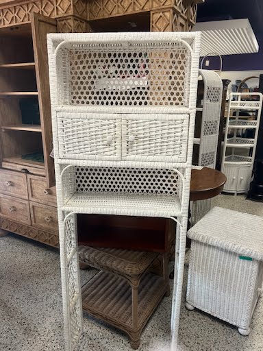 White wicker store bookcase