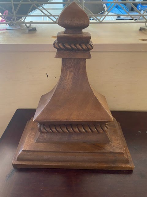 Wood carved wall sconce