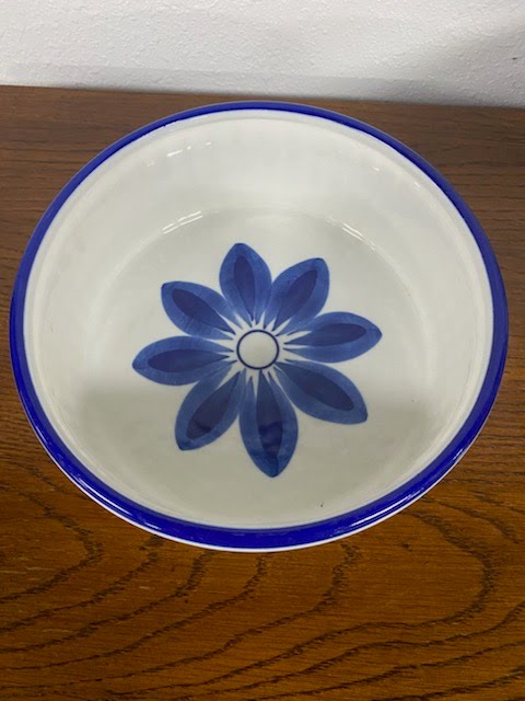 White dish with hand painted blue flower