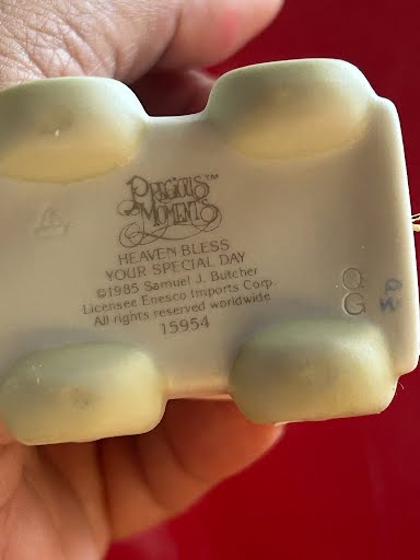 Precious Moments figurine  "Heaven Bless Your Special Day"
