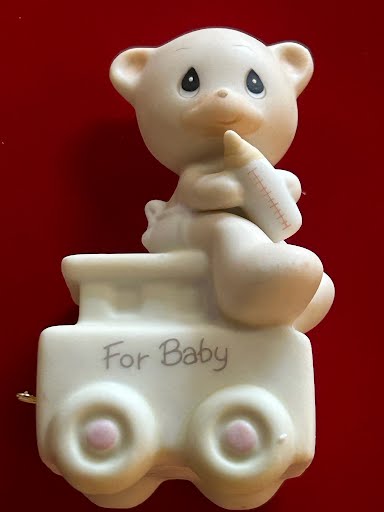 Precious Moments figurine "May Your Birthday Be Warm"
