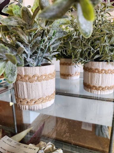 Foliage In White Pottery