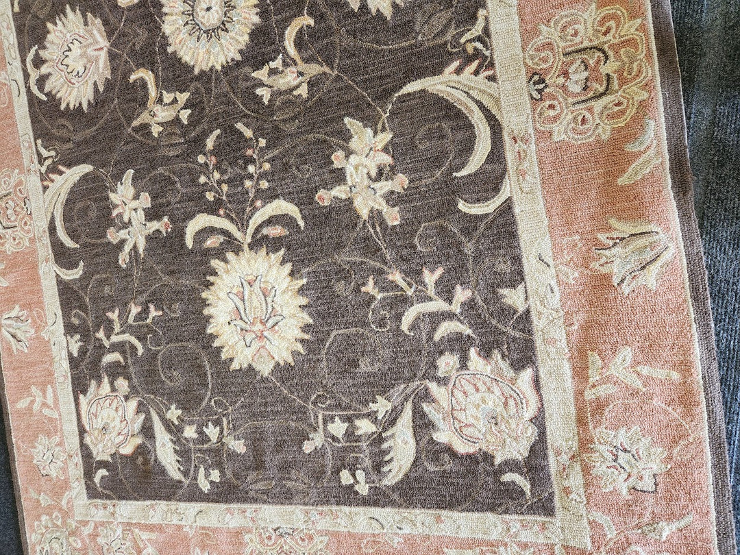 Brown and beige\pink floral area rug