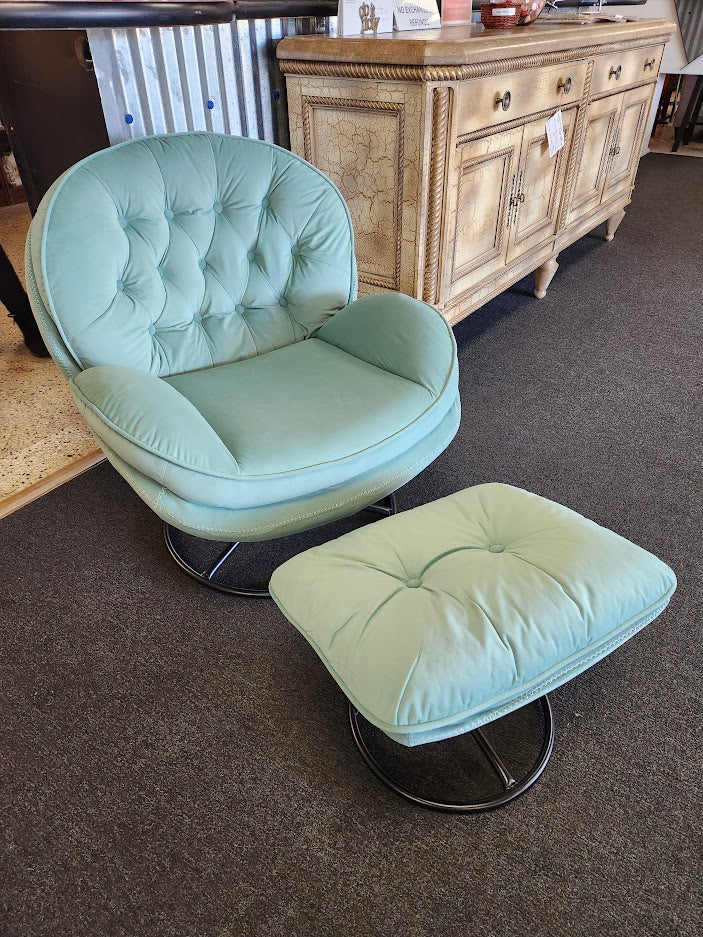 Teal tufted velvet swivel accent chair