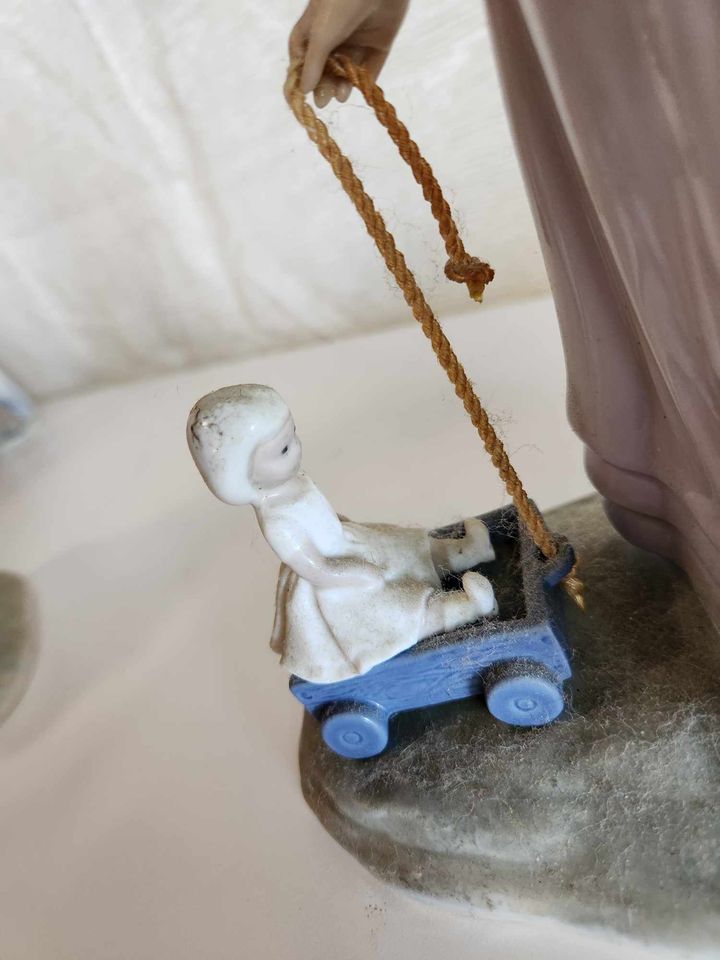 LLADRO "Pulling Dolls Carriage”,PORCELAIN FIGURINE