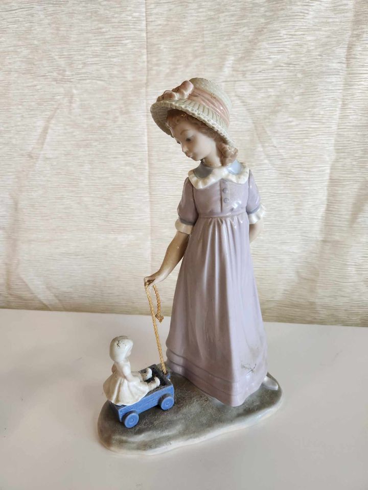 LLADRO "Pulling Dolls Carriage”,PORCELAIN FIGURINE