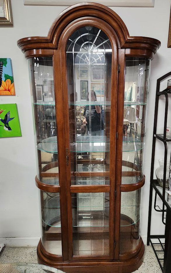 Wooden arched curio cabinet