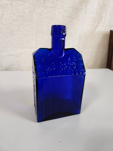 cobalt blue old cabin whiskey bottle 8"