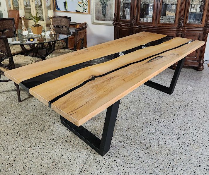 Live-edge wooden dining table w/black epoxy