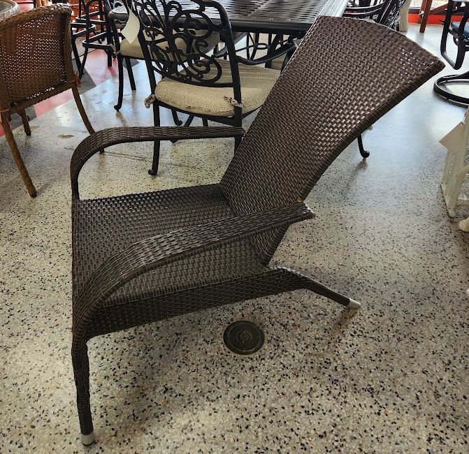 Dark brown resin wicker outdoor lounge chair