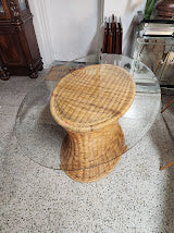 Hourglass-shaped wicker and rattan dining table