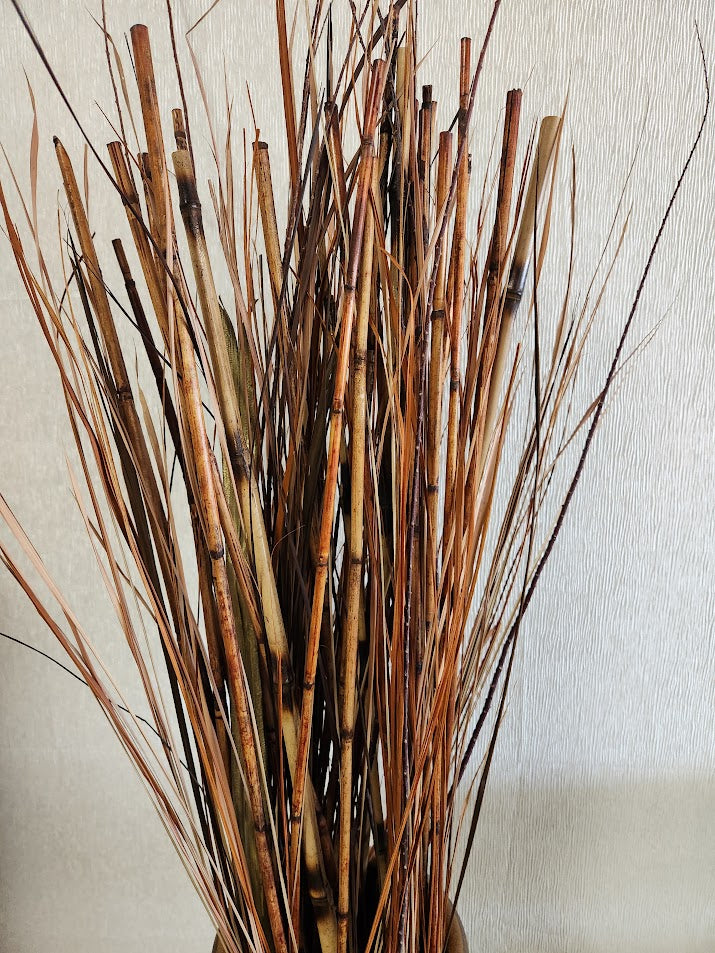 Gold Vase With Bamboo Sticks