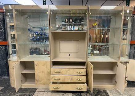 5-piece entertainment center brings contemporary Italian design wall unit with glass panels and drawers.