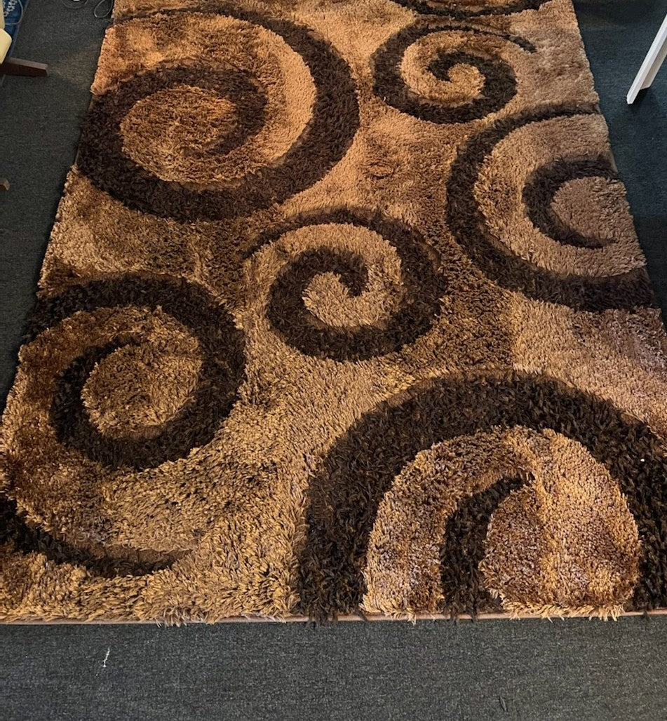 Brown rug with dark brown swirls 7'5x5'2