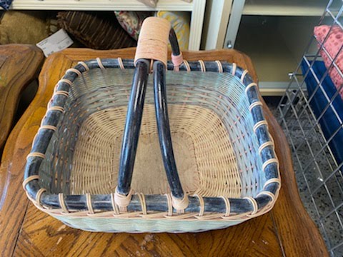 White/multi-color basket with black bamboo handle