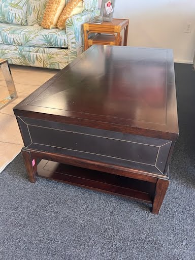 Brown 2 drawer coffe table w/ leather accents