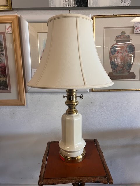 Beige shade table lamp with gold plated accents