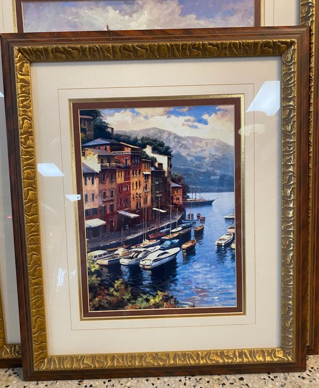 Brown/ gold frame, white matting, sailboats along shoreline