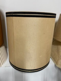 Beige lampshade with black trim