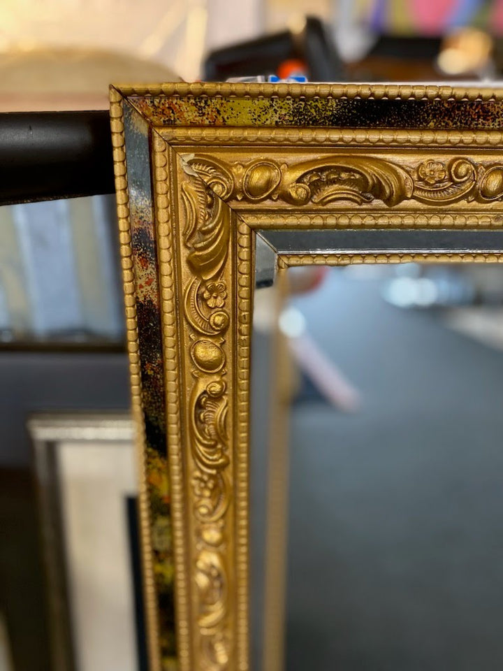 Gold frame mirror, carved design trim