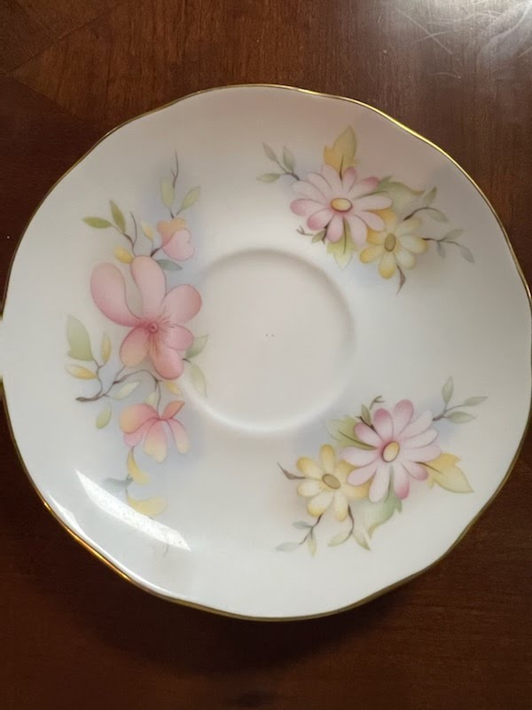 Tea cup and saucer, pink and yellow flowers