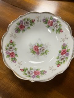 China bowl with pink and purple flowers, gold trim