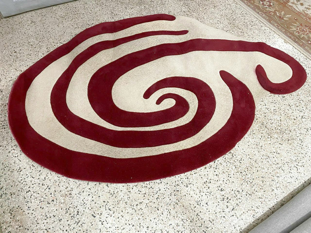 Oval Red Swirl Area Rug