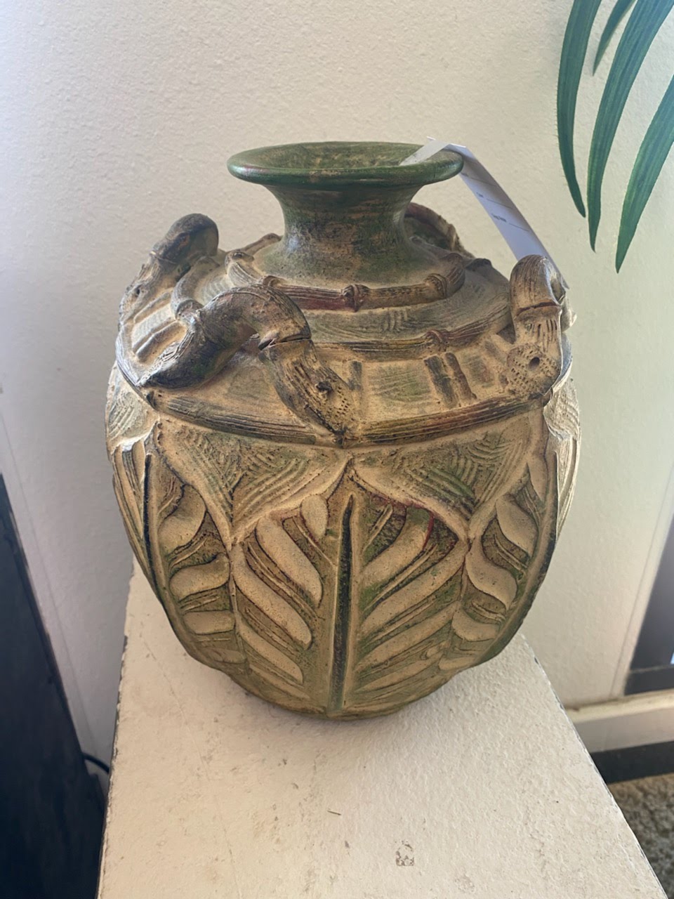 Clay vase with leaf design