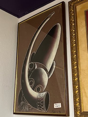 Brown Mask and Horn Wall Art