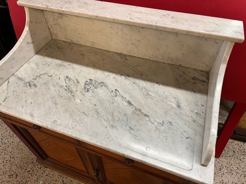 White marble top vanity with drawers