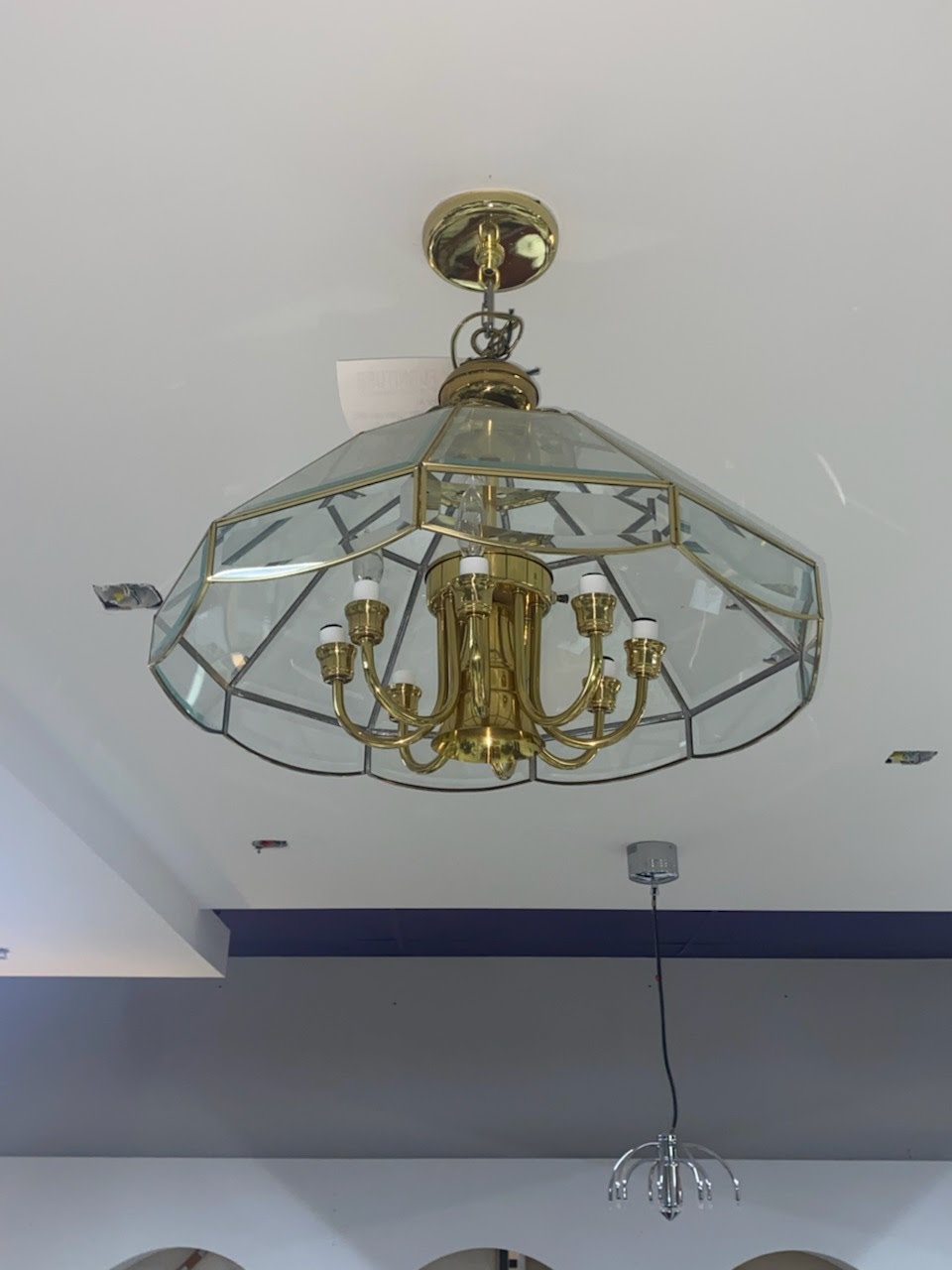 Glass chandelier with gold trim